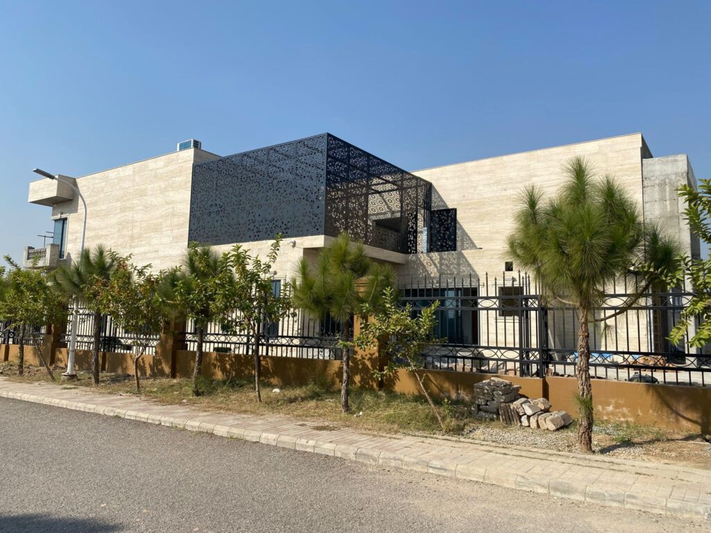 Exterior of luxury farm house by GA Construction in Gulberg Islamabad